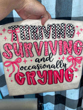 Load image into Gallery viewer, Thriving surviving and occasionally crying Adult Shirt
