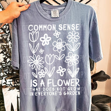 Load image into Gallery viewer, Common Sense Is A Flower Adult Shirt
